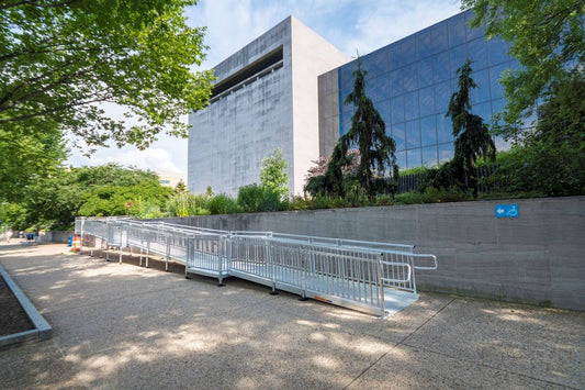 Wheelchair ramp outside of a facility.